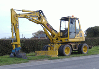 excavator on the roadside